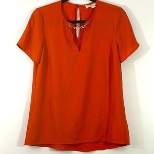 Michael Kors, small, orange tunic top with gold chain neck closure.